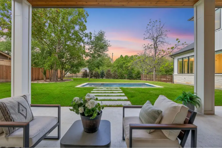 Patio terrace at dusk featuring an outdoor living space, a patio, and a fenced backyard Patio terrace at dusk featuring an outdoor living space, a patio, and a fenced backyard
