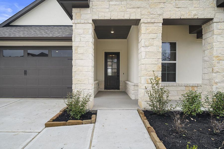 Representative exterior details of a home built from the Sunflower by Caldwell Homes in The Highlands, Porter (Image 32). Representative exterior details of a home built from the Sunflower by Caldwell Homes in The Highlands, Porter (Image 32).