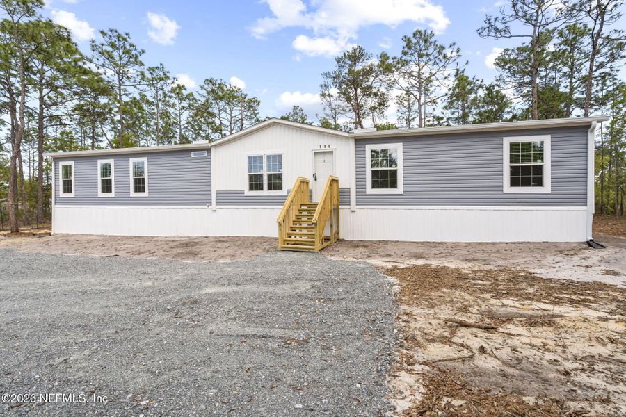 Exterior details and patio area of a home in , Hawthorne (Image 25).