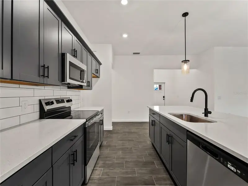 Furnished interior view inside a new home in , North Port (Image 3).