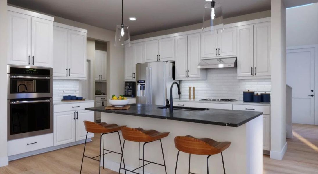 Kitchen with stainless steel appliances, light wood-style flooring, hanging light fixtures, and white cabinetry