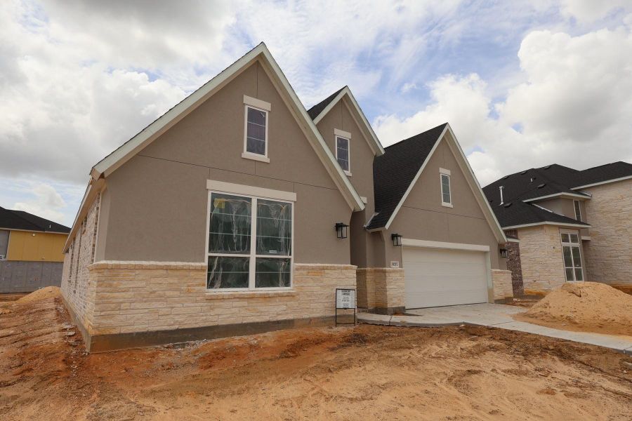 In-progress construction of a new home in Dunham Pointe, Cypress, TX (Image 48).