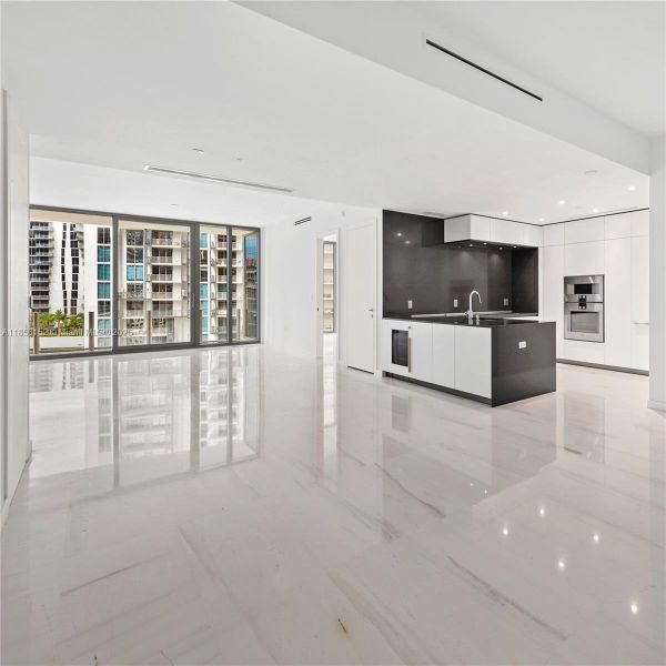 Spacious, unfurnished interior of a new home in Aston Martin Residences, Miami (Image 15).