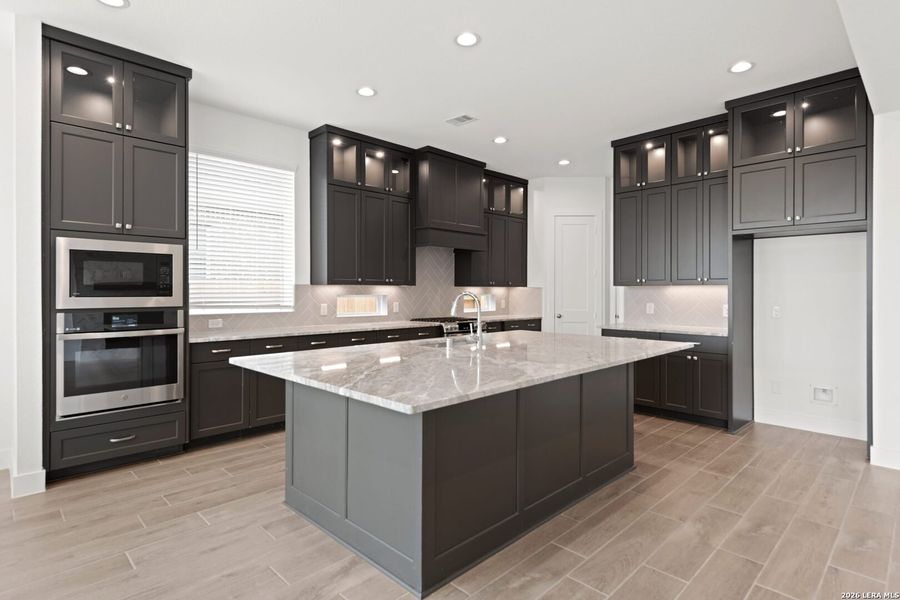 Furnished interior view inside a new home in Village at Three Oaks, Seguin (Image 4).