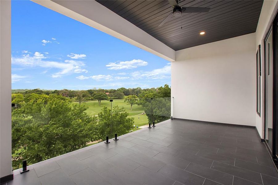 Balcony featuring ceiling fan