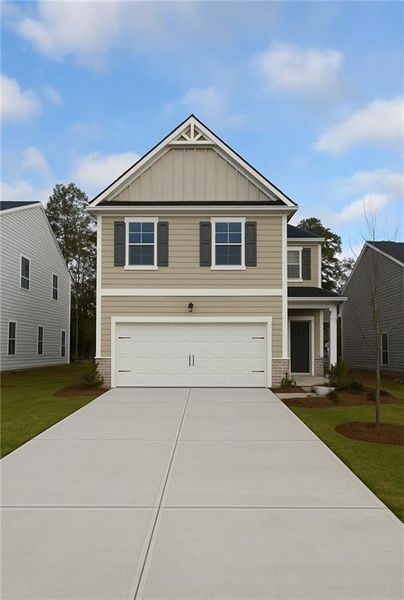 Front exterior of a new home in Fairview Lake, Conyers, GA, highlighting curb appeal (Image 2). Front exterior of a new home in Fairview Lake, Conyers, GA, highlighting curb appeal (Image 2).