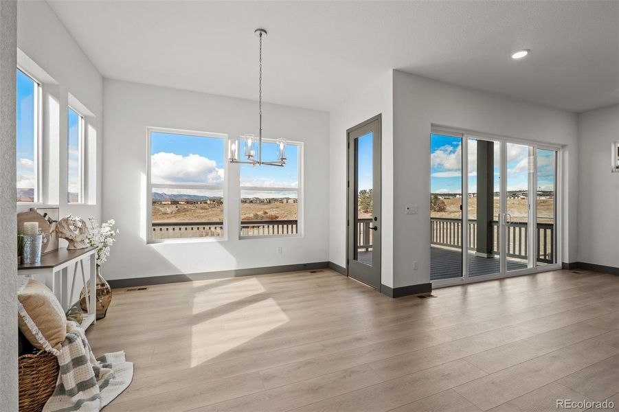 Spacious, unfurnished interior of a new home in Revel Crossing at Wolf Ranch - The Panorama Collection, Colorado Springs (Image 40).