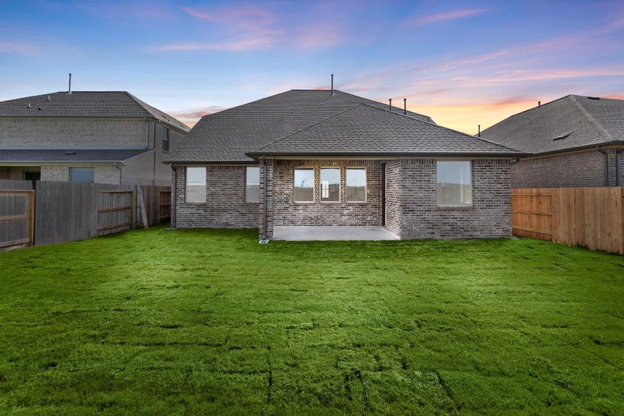 Front exterior of a new home in Brookewater, Rosenberg, TX, highlighting curb appeal (Image 1). Front exterior of a new home in Brookewater, Rosenberg, TX, highlighting curb appeal (Image 1).