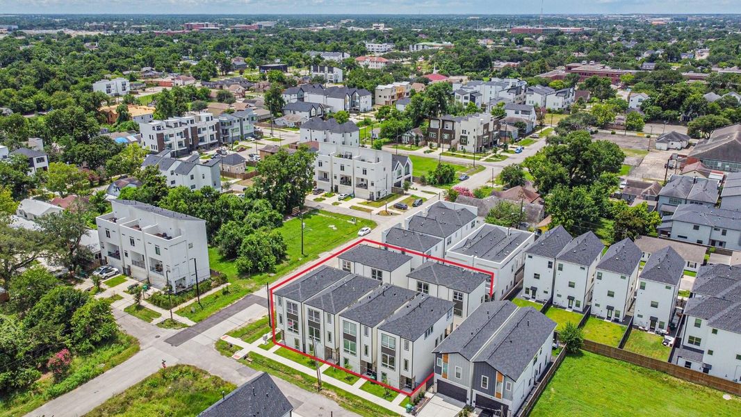 Photo shows six detached three-story homes and the surrounding community. Three homes are currently available for sale — please inquire for more details. Photo shows six detached three-story homes and the surrounding community. Three homes are currently available for sale — please inquire for more details.