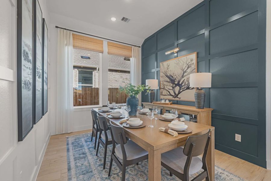Representative furnished interior of a home built from the Hampton by Chesmar Homes in Meridiana 50's and 60's, Manvel (Image 16).