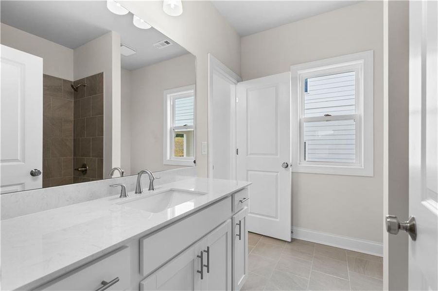 Furnished interior view inside a new home in Palisades Single Family, Cumming (Image 4). Furnished interior view inside a new home in Palisades Single Family, Cumming (Image 4).