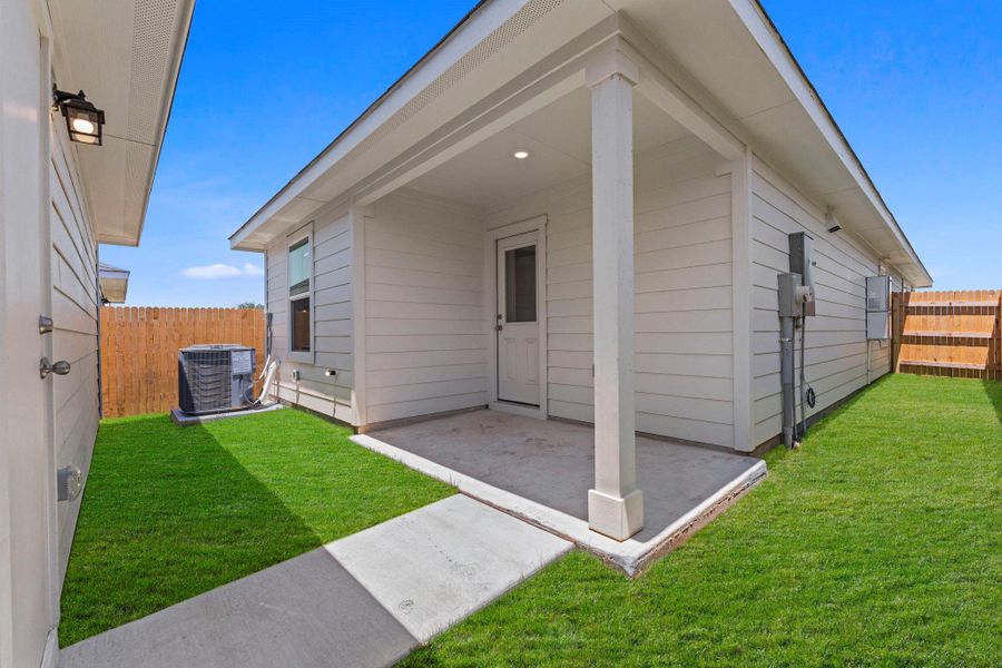 Exterior details and patio area of a home in Valverde, Bastrop (Image 16).