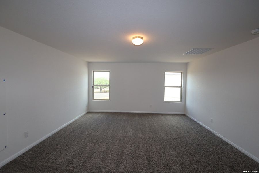 Spacious, unfurnished interior of a new home in Verano Farms, Von Ormy (Image 17).