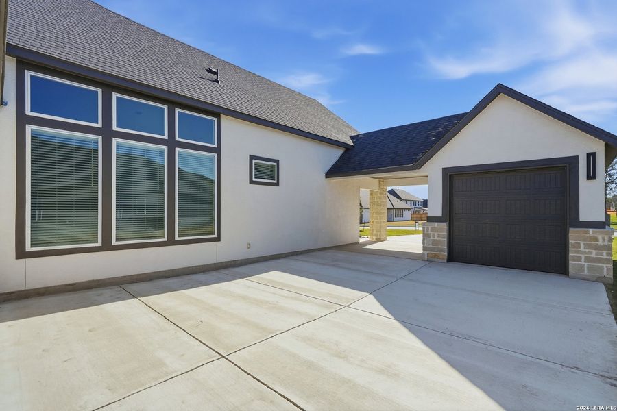 Exterior details and patio area of a home in Potranco Oaks, Castroville (Image 4).