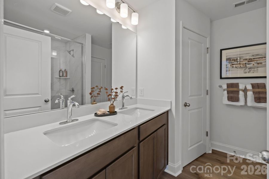 Representative photo from model Owners Bathroom