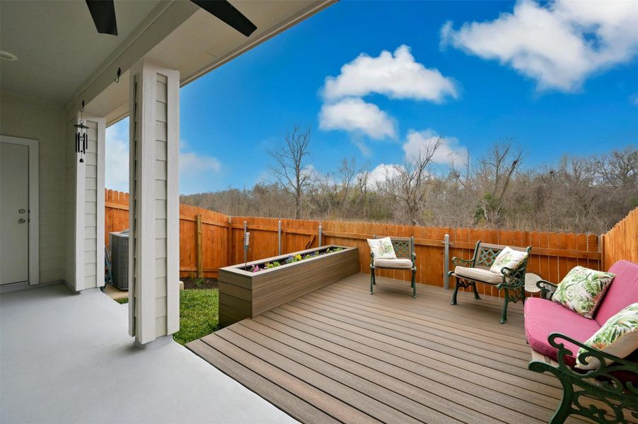 Wooden deck with ceiling fan and central AC