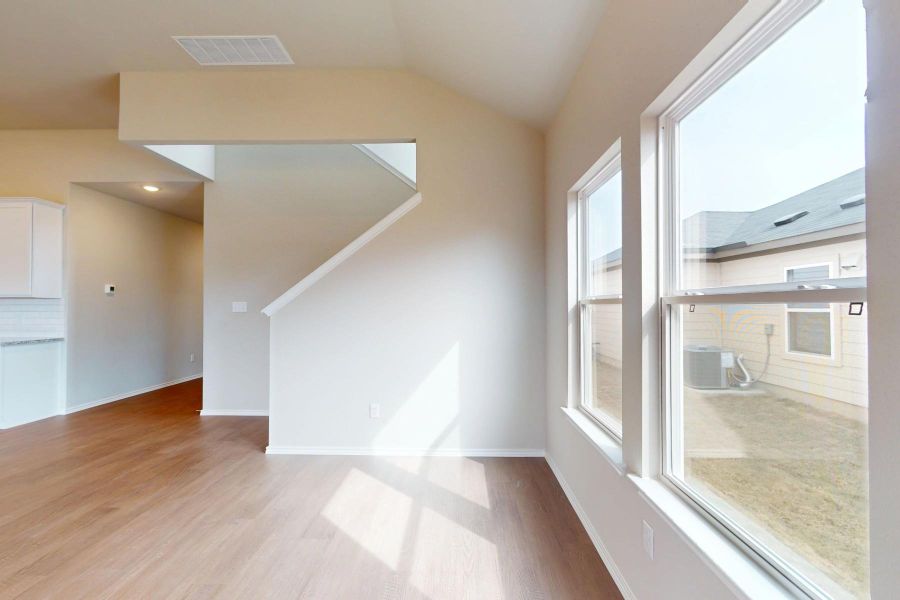 Spacious, unfurnished interior of a new home in Carillon, Manor (Image 17).