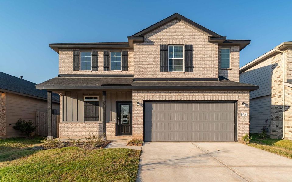 Front exterior of a new home in Caney Mills, Conroe, TX, highlighting curb appeal (Image 1). Front exterior of a new home in Caney Mills, Conroe, TX, highlighting curb appeal (Image 1).