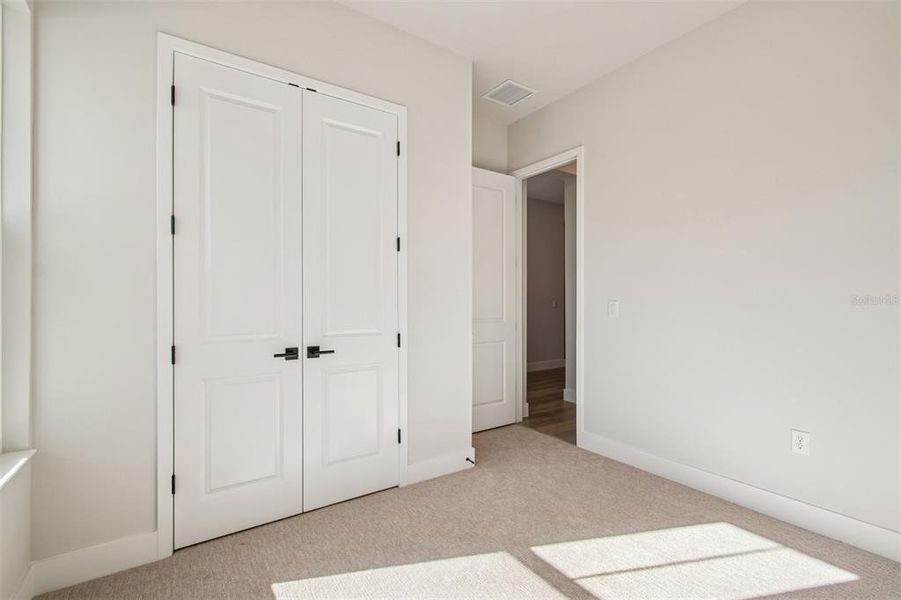 Spacious, unfurnished interior of a new home in Emerald Landing at Waterside at Lakewood Ranch – Lake Series, Sarasota (Image 34).