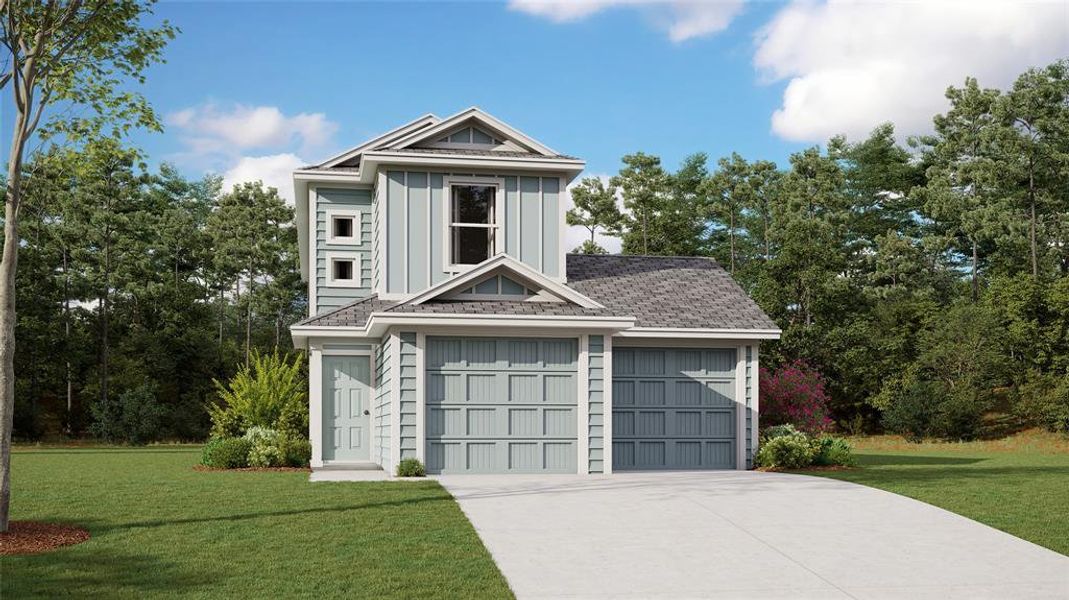 View of front facade with a garage and a front lawn