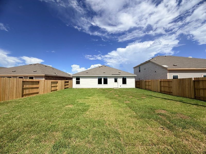 Exterior details and patio area of a home in Monarch Landing, Needville (Image 2). Exterior details and patio area of a home in Monarch Landing, Needville (Image 2).
