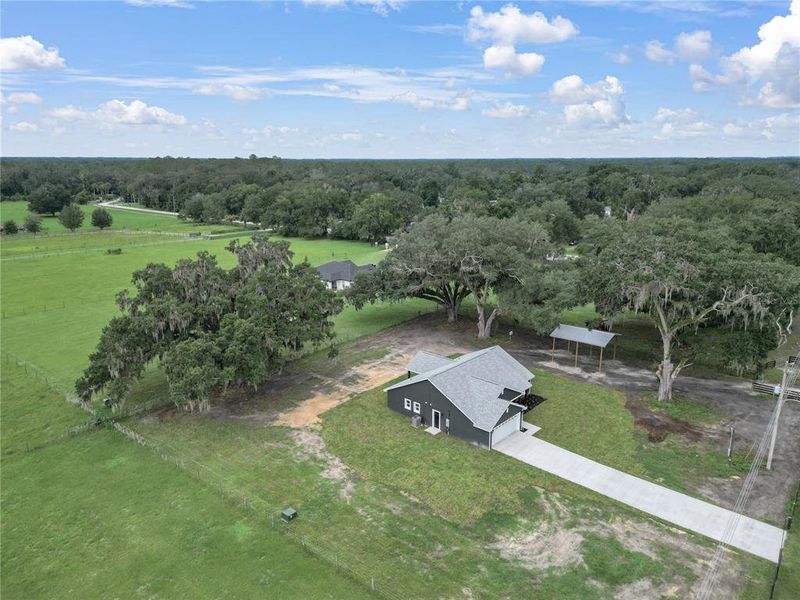 Front exterior of a new home in , Bushnell, FL, highlighting curb appeal (Image 22).
