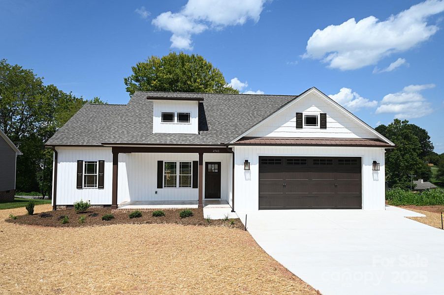 Front exterior of a new home in , Hickory, NC, highlighting curb appeal (Image 21).