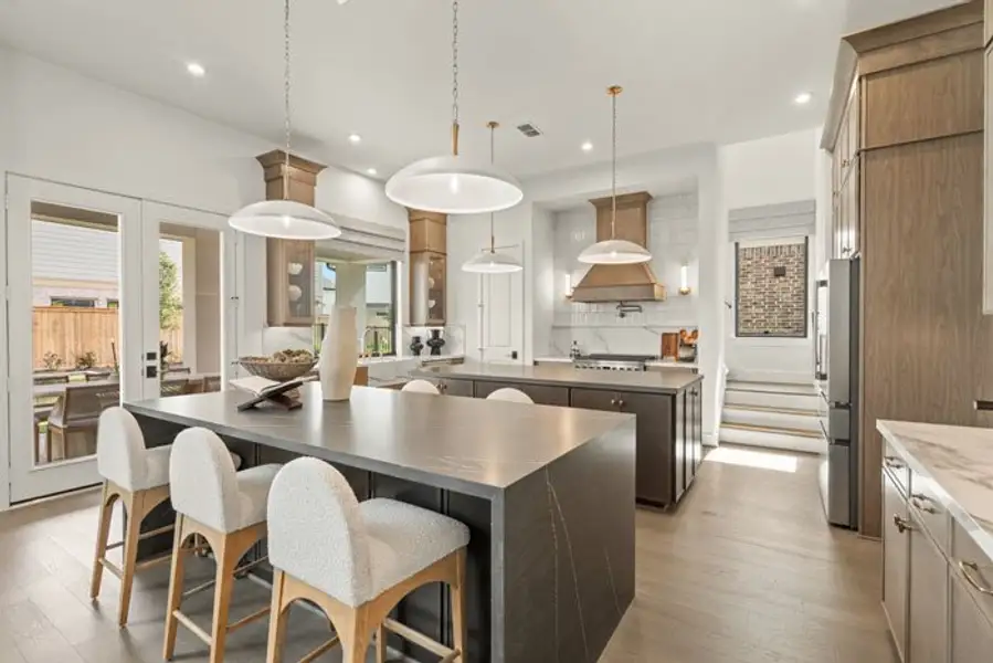 Furnished interior view inside a new home in Bridgeland 45', 50', 70', Cypress (Image 3).