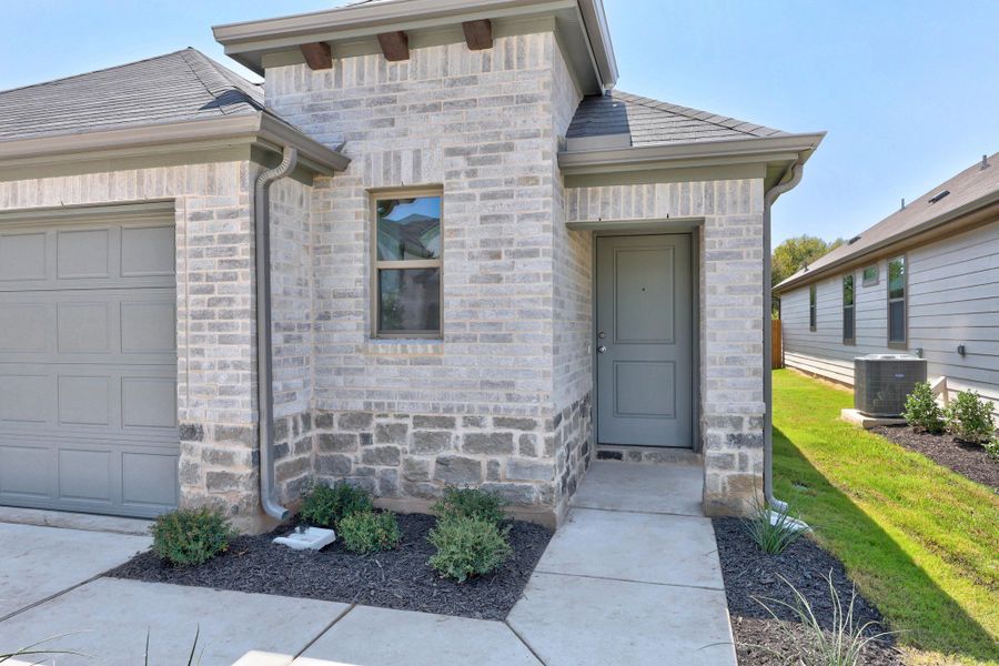 Exterior details and patio area of a home in Trinity Ranch, Elgin (Image 3).