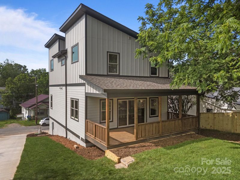 Front exterior of a new home in , Asheville, NC, highlighting curb appeal (Image 1). Front exterior of a new home in , Asheville, NC, highlighting curb appeal (Image 1).