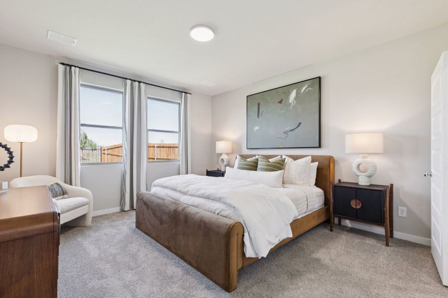 Primary Suite in the Magnolia home plan by Trophy Signature Homes – REPRESENTATIVE PHOTO