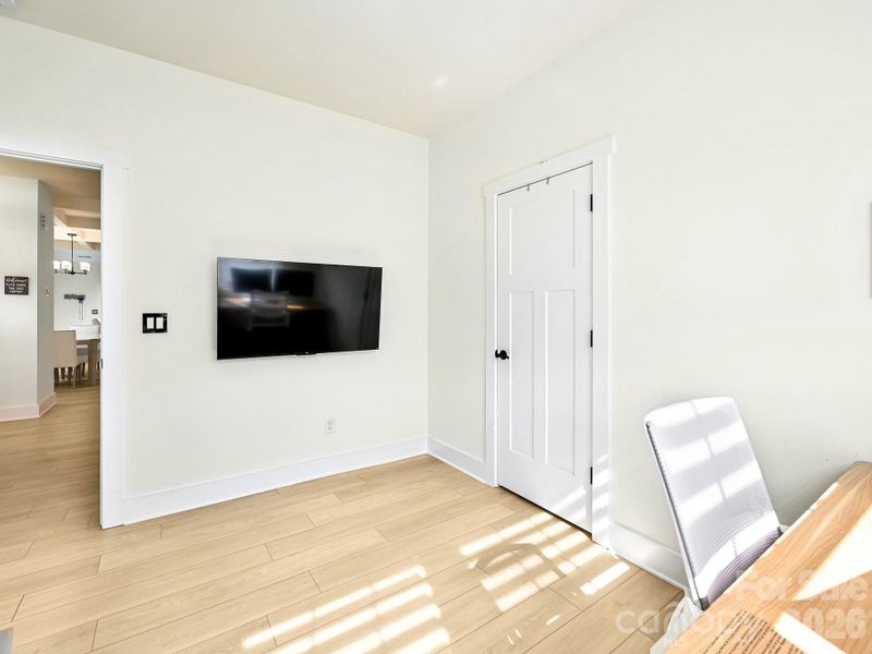 Second bedroom on main level. Mounted TV may stay with home.