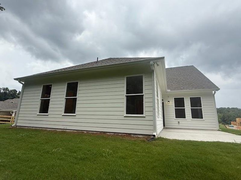 Front exterior of a new home in , Canton, GA, highlighting curb appeal (Image 2).