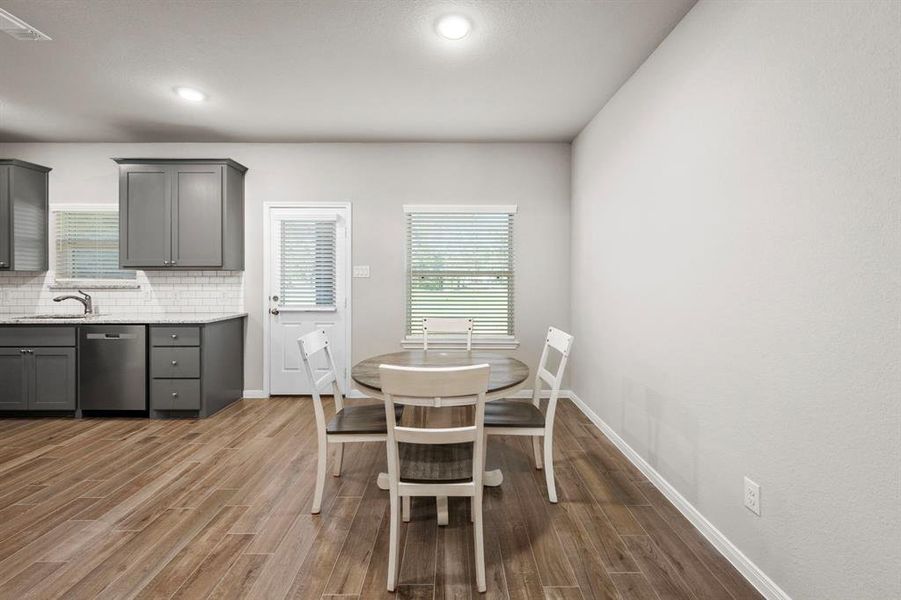 Spacious dining area will accommodate the largest of dining tables makes entertaining a breeze. The perfect space for formal entertaining or to just relax and enjoy that morning cup of coffee.