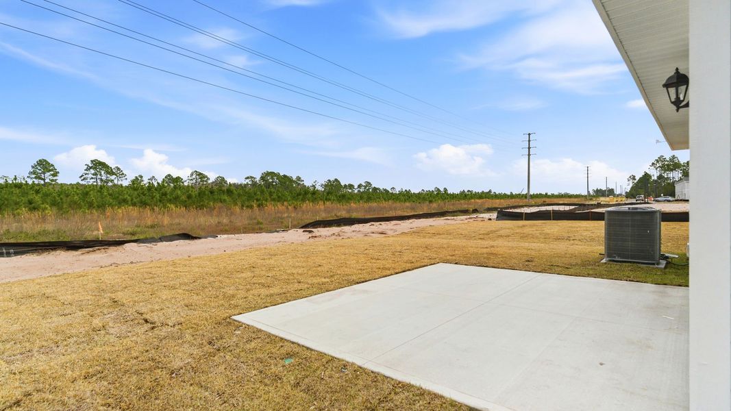 Exterior details and patio area of a home in Chateau Nemours, Port Saint Joe (Image 3).