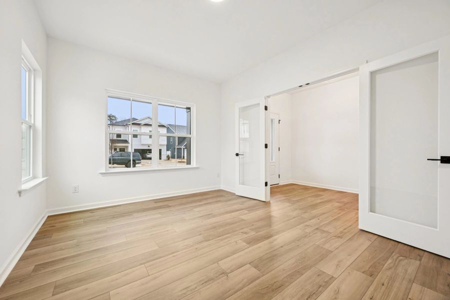 Study featuring the AW Collection® Rosemary - A quiet retreat with deep hues and light wood.