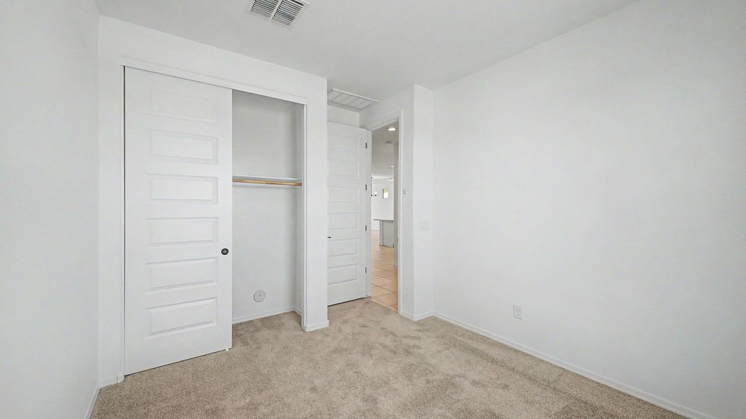Representative furnished interior of a home built from the Acacia II by DRB Homes in Apache Farms, Buckeye (Image 21).