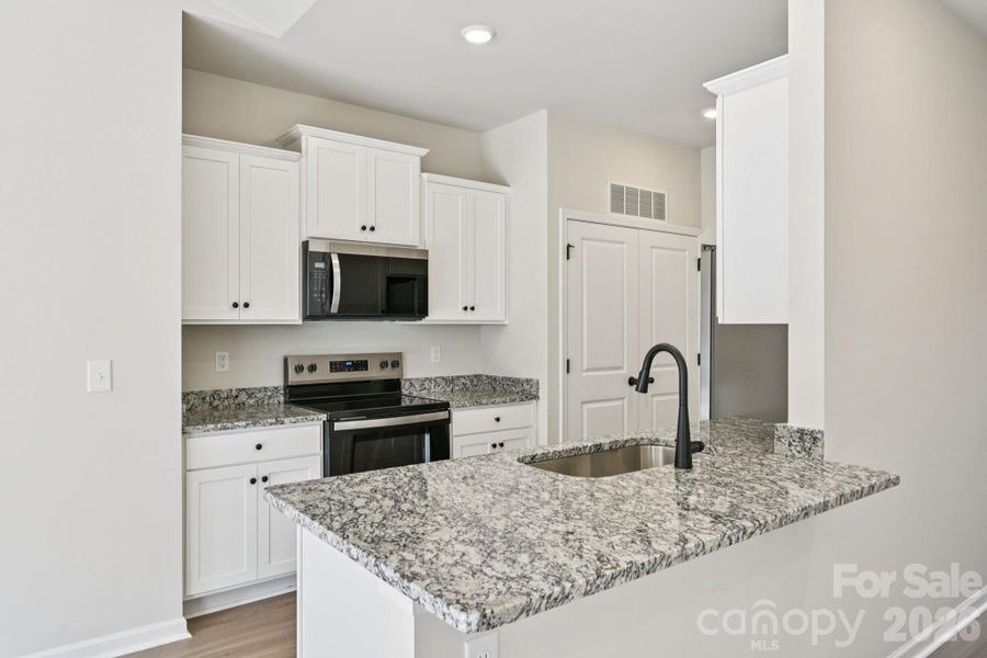 Furnished interior view inside a new home in Willow Estates, Shelby (Image 11).