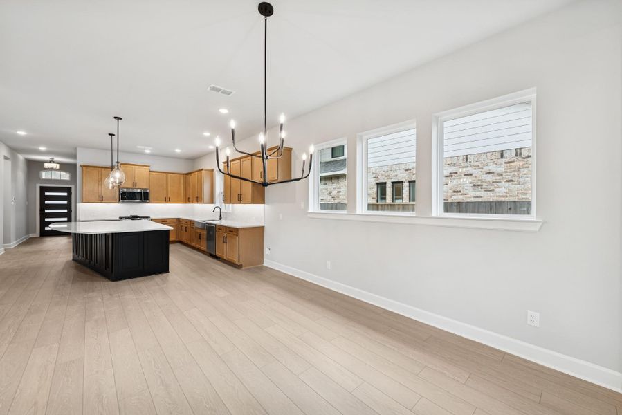 Furnished interior view inside a new home in Meridiana 55' Homesites, Manvel (Image 4).