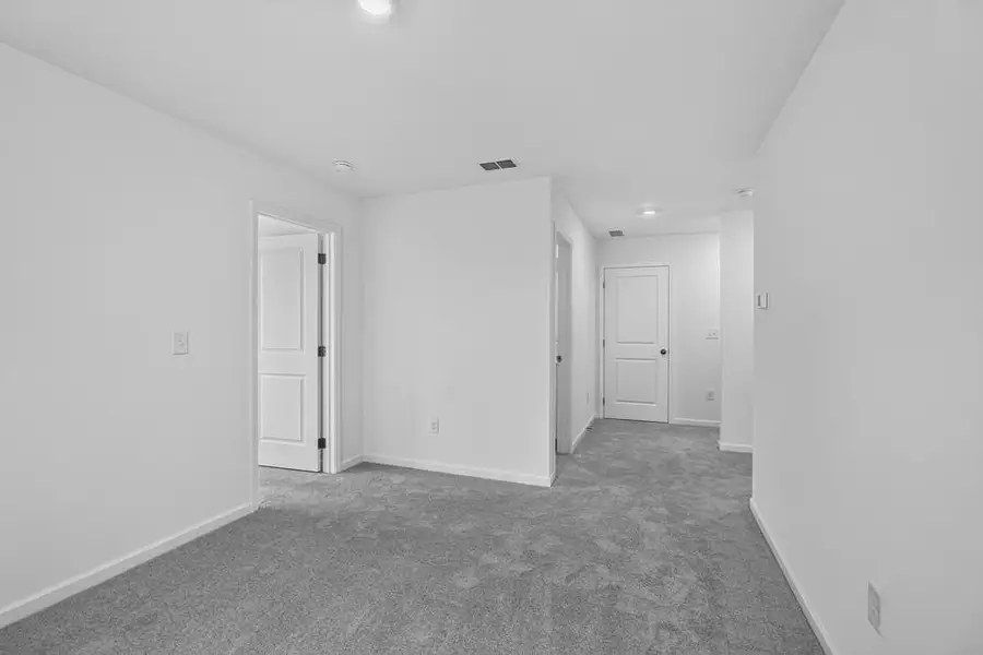 Spacious, unfurnished interior of a new home in Weatherfield, Buford (Image 41).