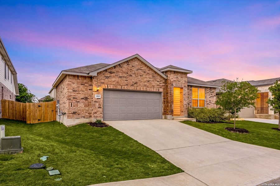 Front exterior of a new home in Riverstone at Westpointe, San Antonio, TX, highlighting curb appeal (Image 26).