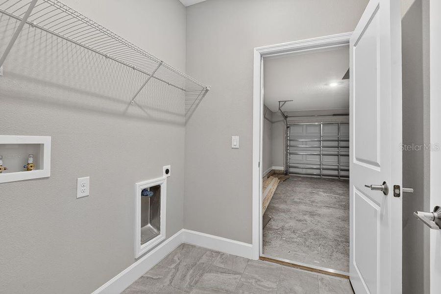 Spacious, unfurnished interior of a new home in Colbert Landings, Palm Coast (Image 24).