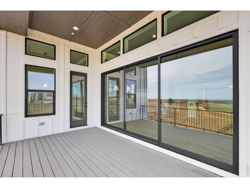 Exterior details and patio area of a home in RainDance, Windsor (Image 4).