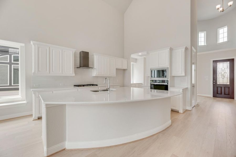 Representative furnished interior of a home built from the Royal Martinique by Grand Homes in Prairie Ridge, Venus (Image 5). Representative furnished interior of a home built from the Royal Martinique by Grand Homes in Prairie Ridge, Venus (Image 5).