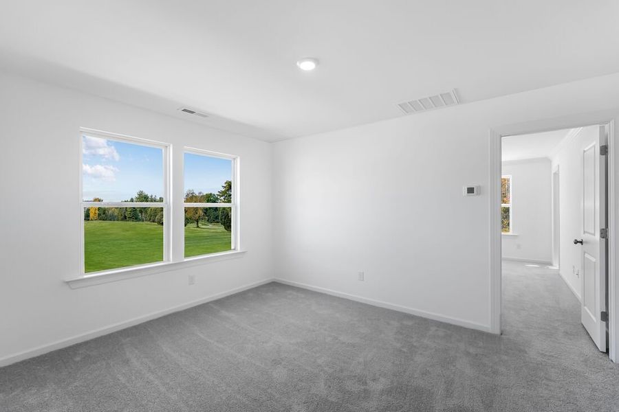 Spacious, unfurnished interior of a new home in Magnolia Townes, Wendell (Image 9).