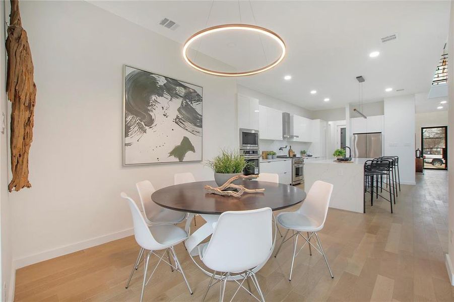 Dining room featuring light hardwood / wood-style flooring