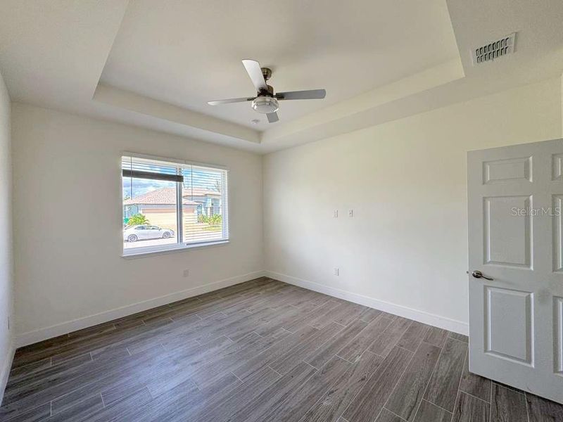 Spacious, unfurnished interior of a new home in , Port Charlotte (Image 12).