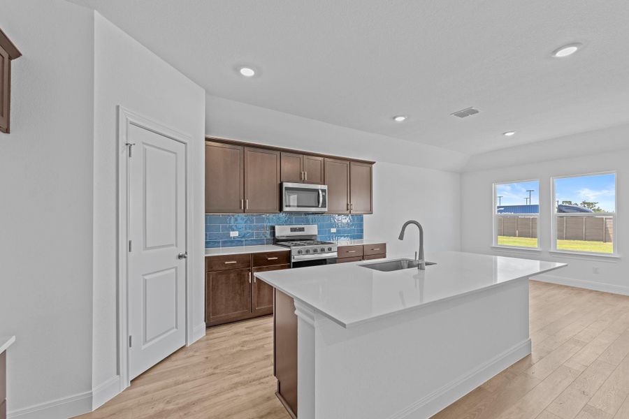 Furnished interior view inside a new home in Railhead, Cedar Creek (Image 5).