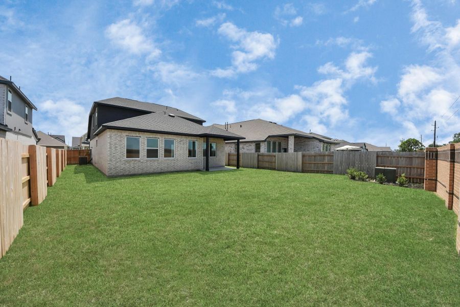 Exterior details and patio area of a home in 50' Traditional Homes at Elyson, Katy (Image 22).