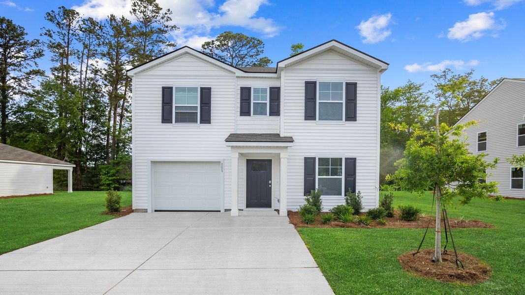Front exterior of a new home in Rice Hope, Port Wentworth, GA, highlighting curb appeal (Image 1). Front exterior of a new home in Rice Hope, Port Wentworth, GA, highlighting curb appeal (Image 1).